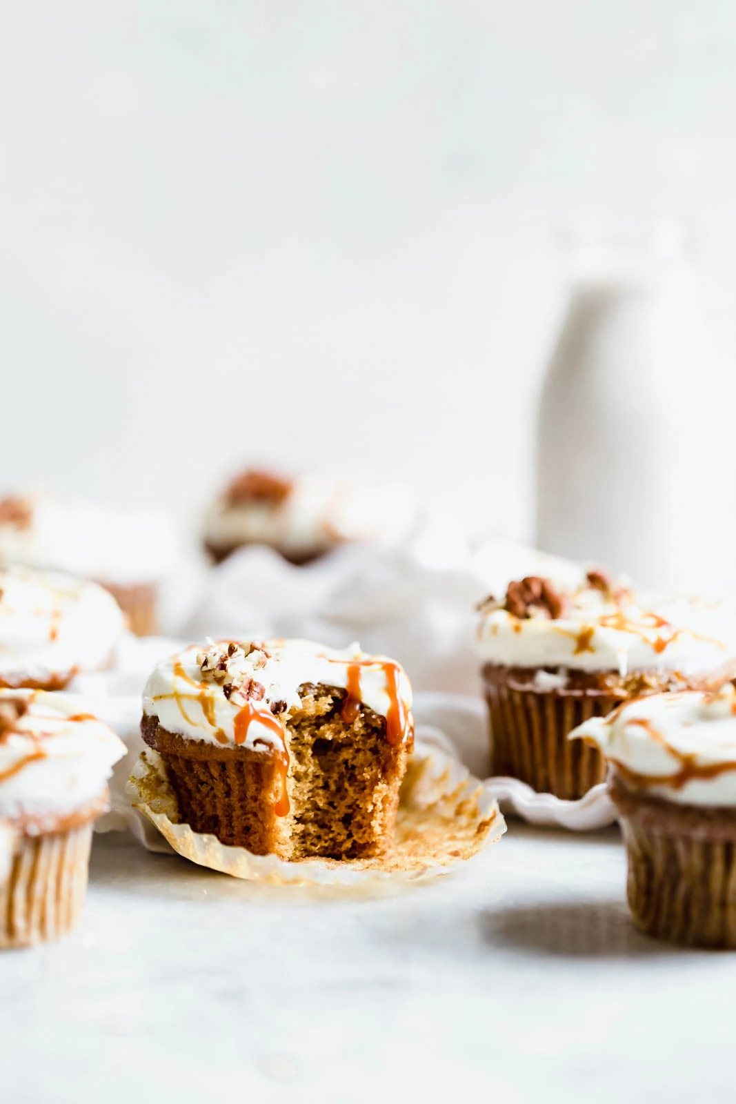 The perfect winter cupcake is here! Sweet potato cupcakes flavored with cinnamon and ginger and topped with a tangy cream cheese frosting. 