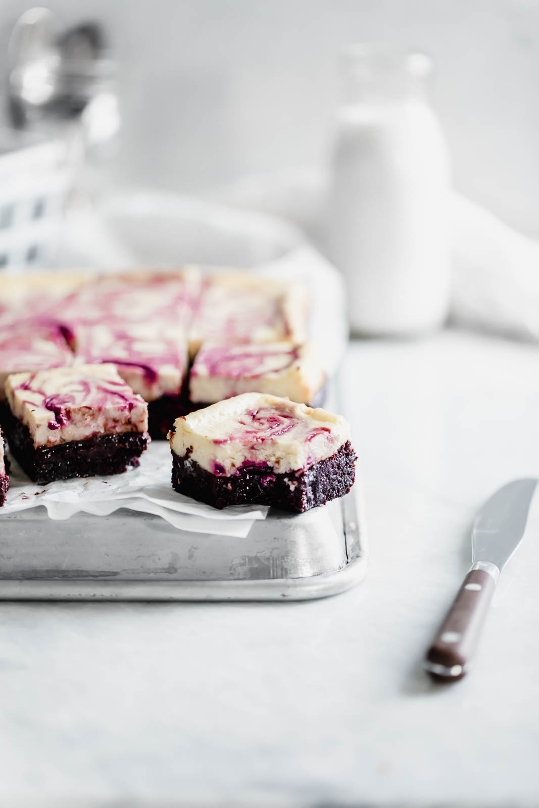 Rich fudge brownies topped with creamy cheesecake and a sinful black cherry swirl. Easy to make and even easier to devour.