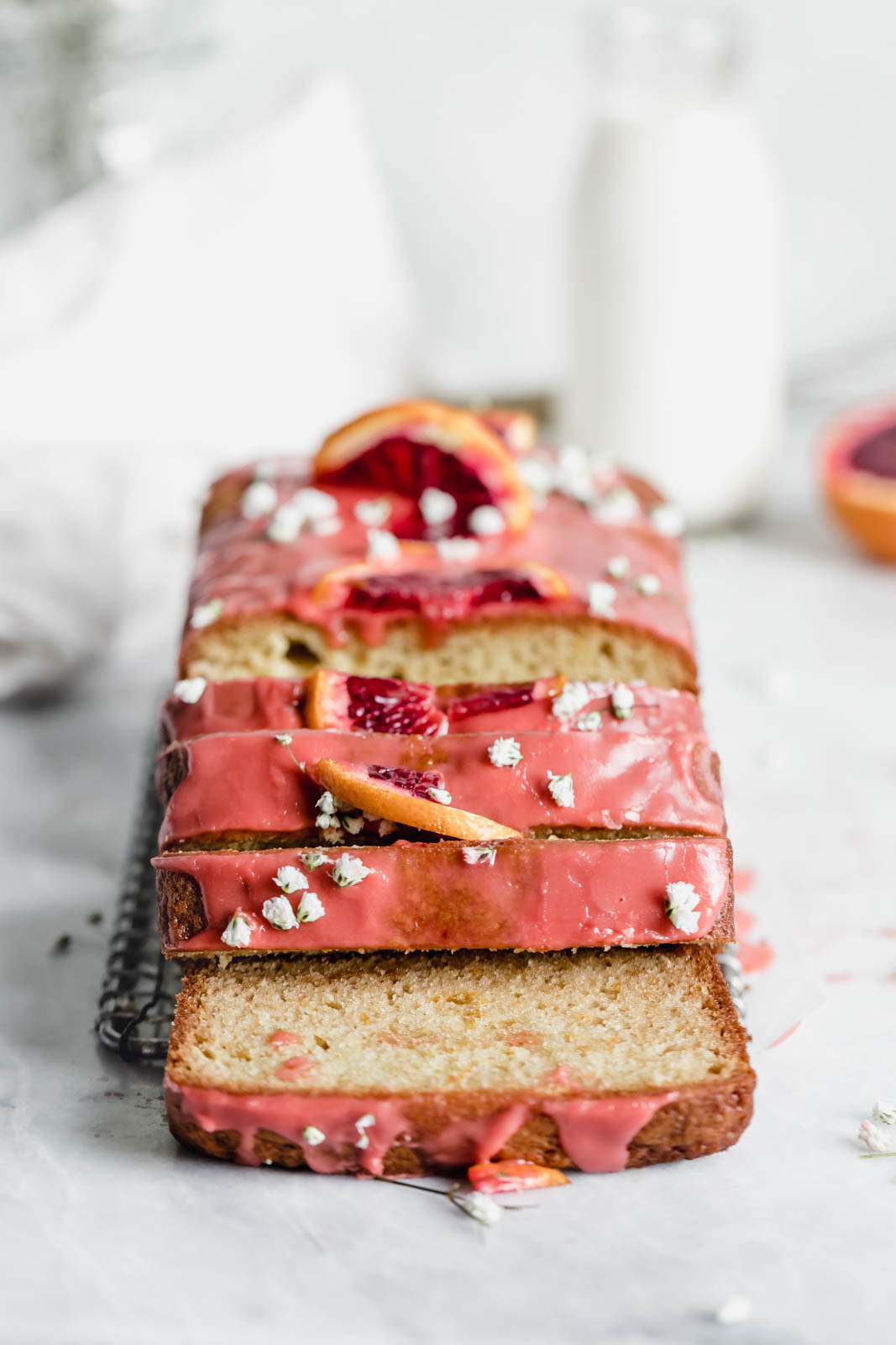 Celebrate citrus season with this beautiful blood orange loaf cake made with greek yogurt and topped with the perfect tangy pink glaze.