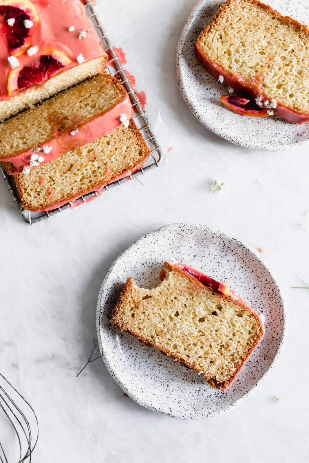 Celebrate citrus season with this beautiful blood orange loaf cake made with greek yogurt and topped with the perfect tangy pink glaze.