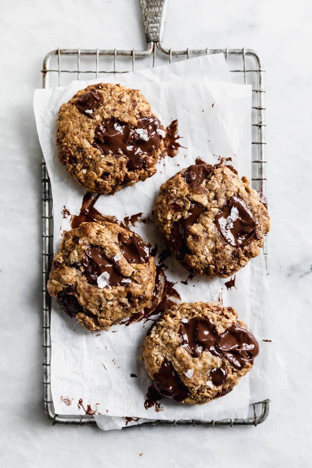 Yes these Tahini Oatmeal Chocolate Chunk Cookies are vegan, gluten free, and refined sugar free, but they sure as heck don't taste like a healthy food.