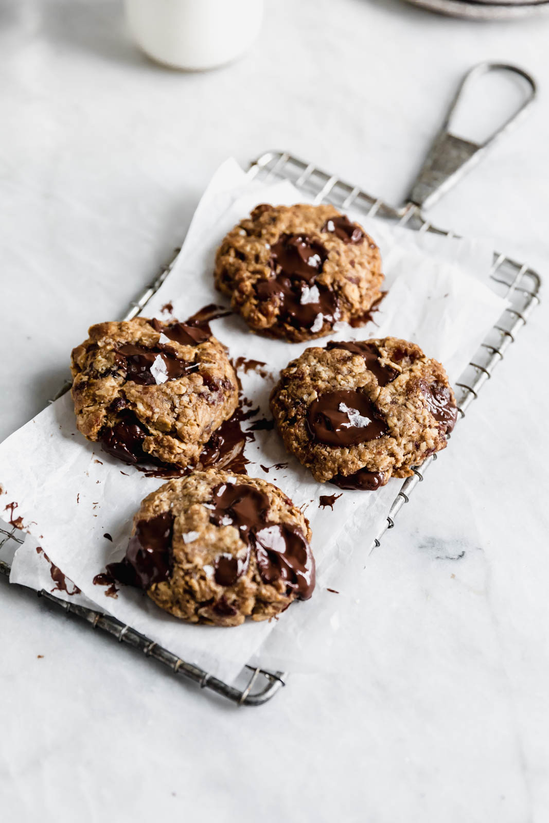 Yes these Tahini Oatmeal Chocolate Chunk Cookies are vegan, gluten free, and refined sugar free, but they sure as heck don't taste like health food. DROOL.