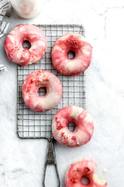 These baked strawberries and cream donuts are loaded wtih strawberries and dipped in fresh creamy glazeBetter yet, they're baked.