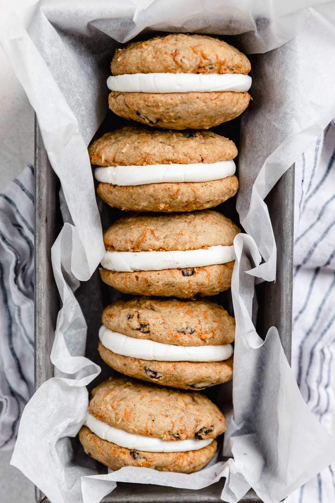 These carrot cake sandwich cookies take all your favorite flavors from classic carrot cake into a transportable sandwich. Perfect for Easter or any time!