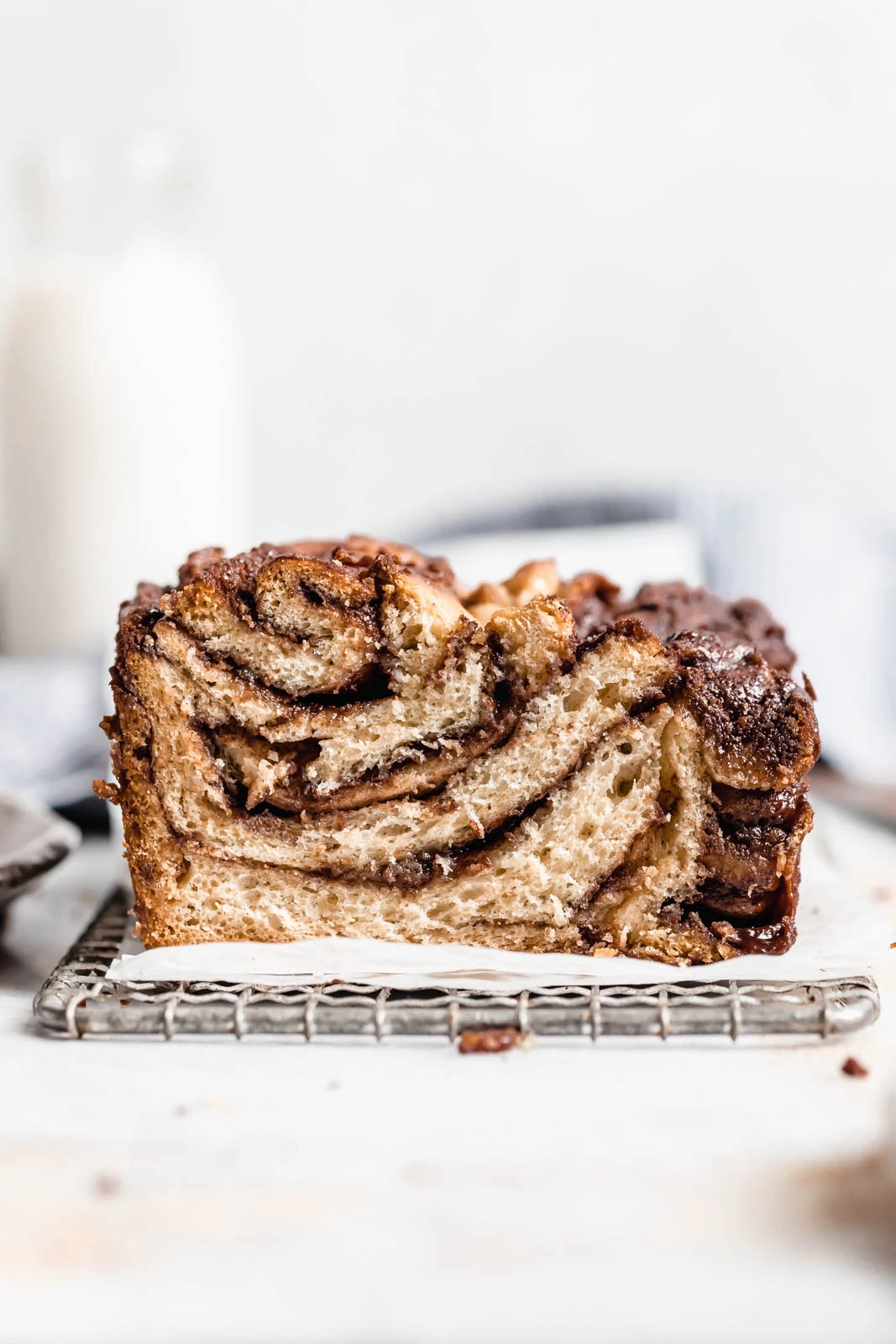 Buttery, flaky dough swirled together with cinnamon AND chocolate make this stunning Cinnamon Chocolate Babka. Step by step instructions on how to make the perfect babka!