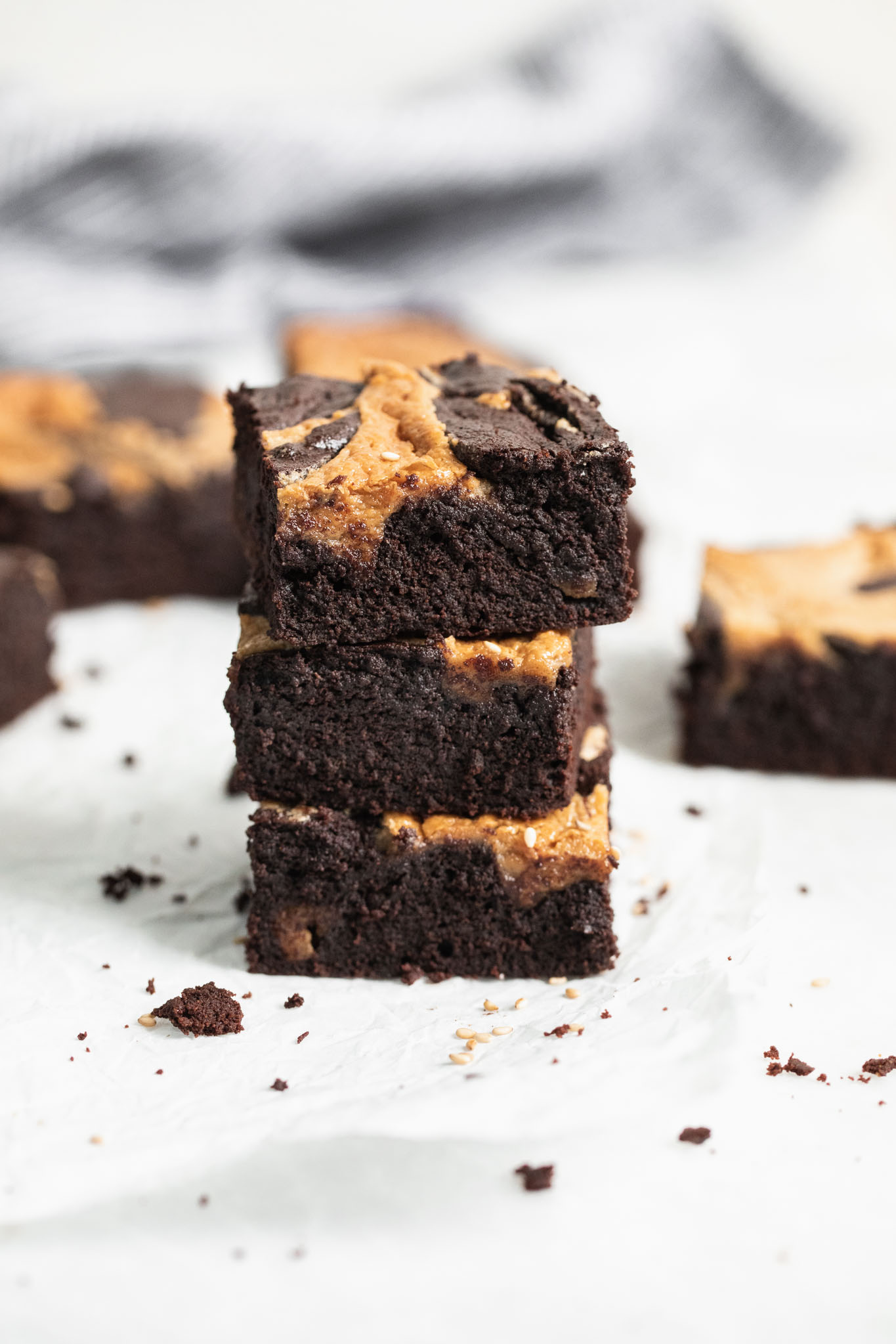 Introducing Halva Brownies AKA thick fudgy brownies swirled with ribbons of halva, my favorite middle eastern confection. Think tahini brownies, but better!