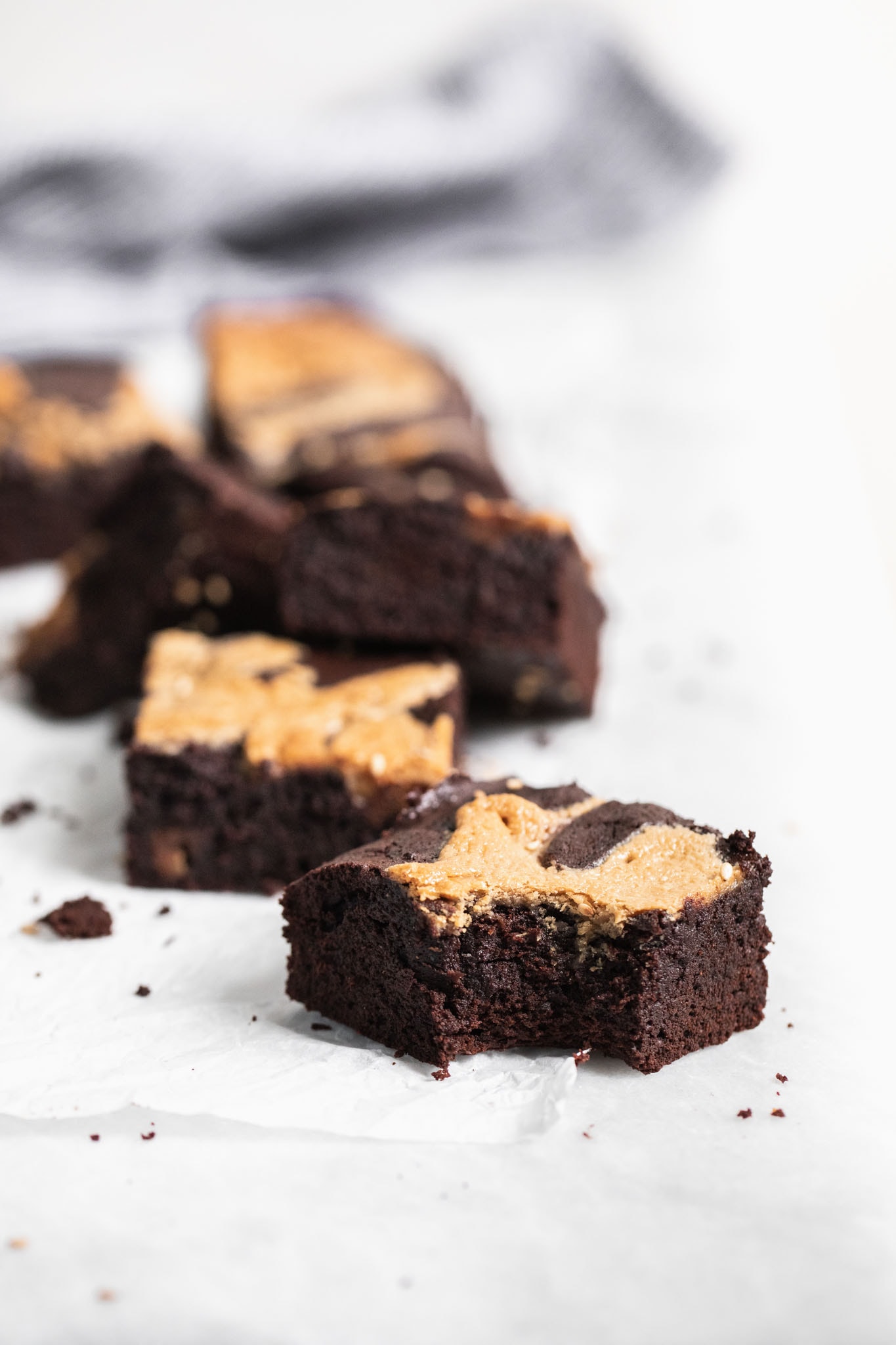 Introducing Halva Brownies AKA thick fudgy brownies swirled with ribbons of halva, my favorite middle eastern confection. Think tahini brownies, but better!