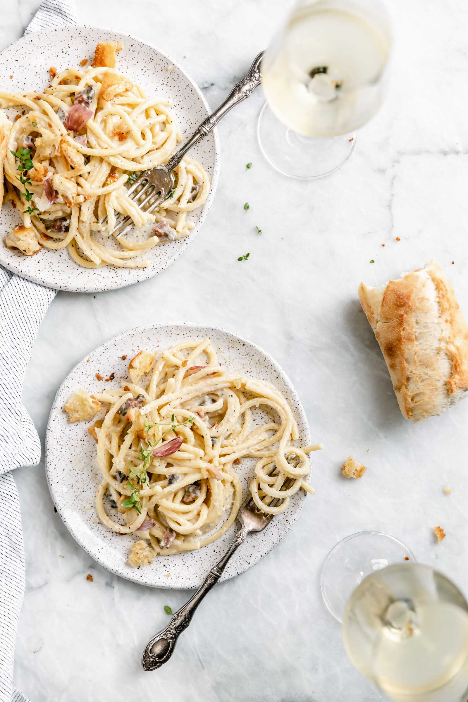 A creamy Roman classic made with bucatini, guanciale, parmigiano, and egg yolks, this Date Night Pasta Carbonara is perfectly portioned for two!