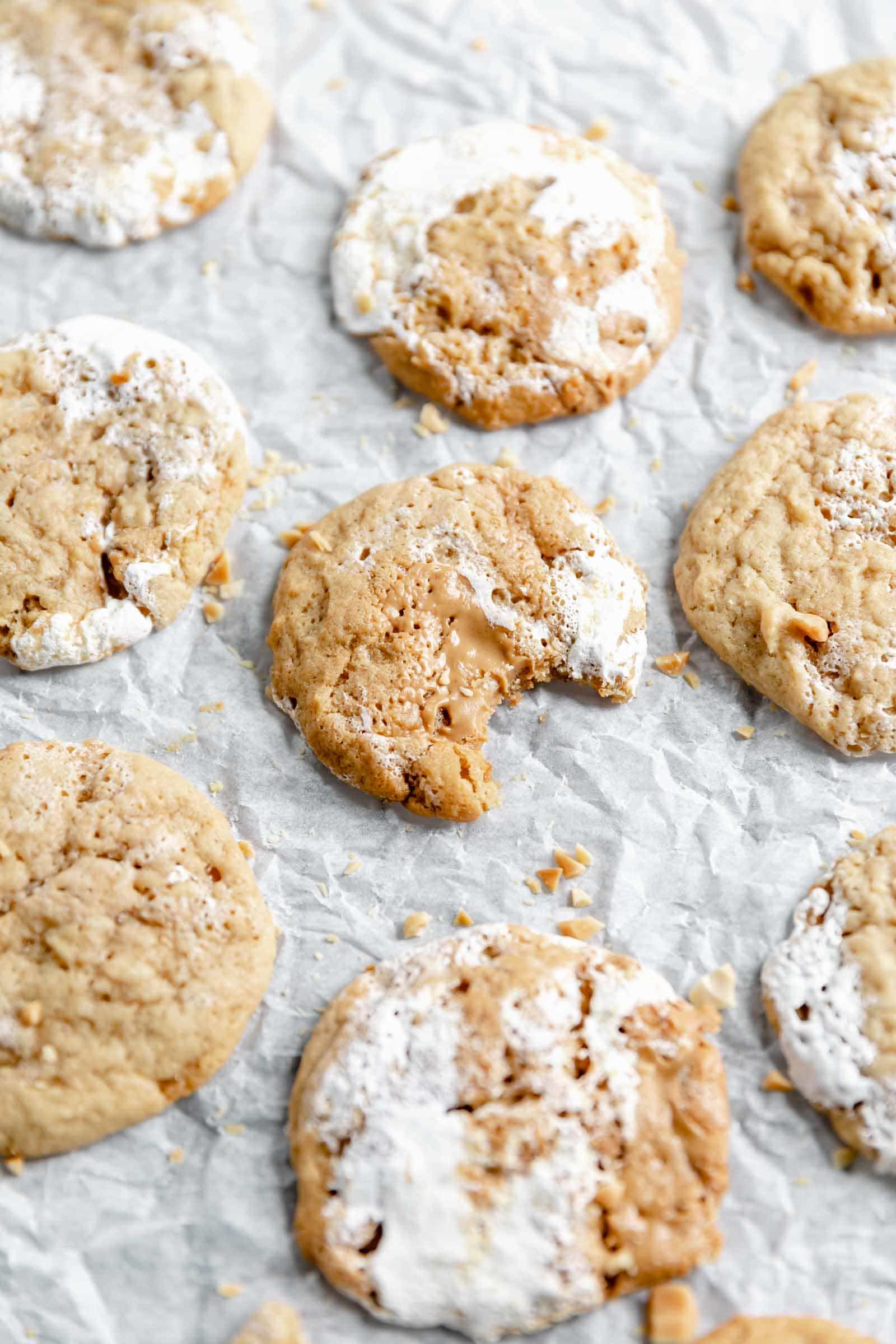 peanut butter and fluff cookies with a bite taken out