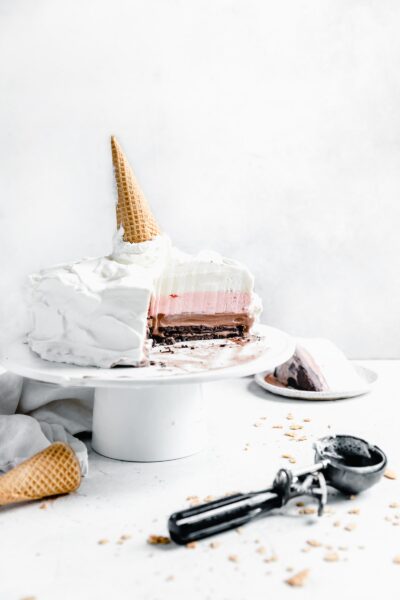 Neapolitan ice cream cake with slice out