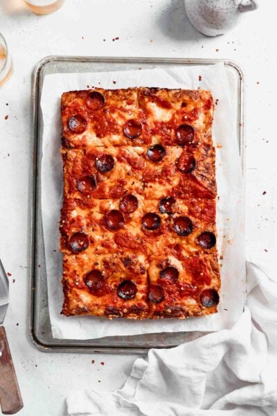 Crispy on the outside, chewy in the middle, Detroit-Style Pizza topped with two pounds of cheese, sauce, and your choice of topping. Um, can you say drool?