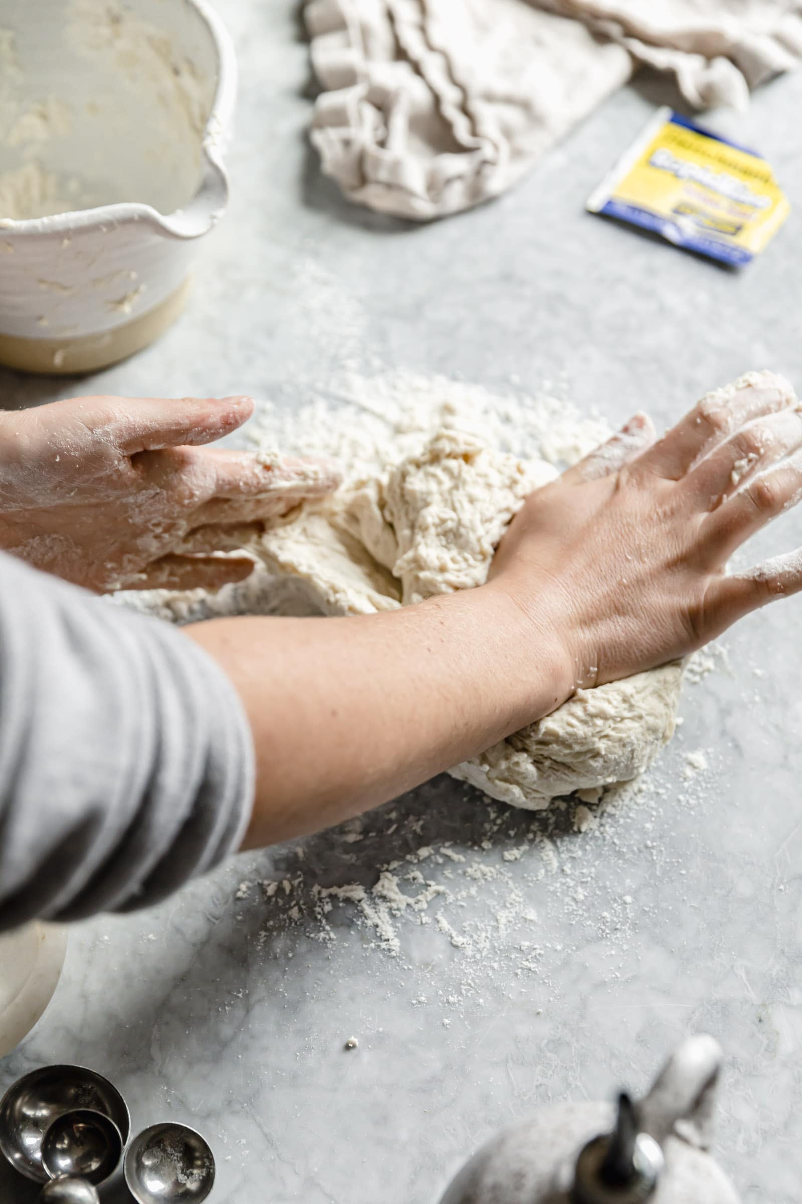 kneading pizza dough by hand