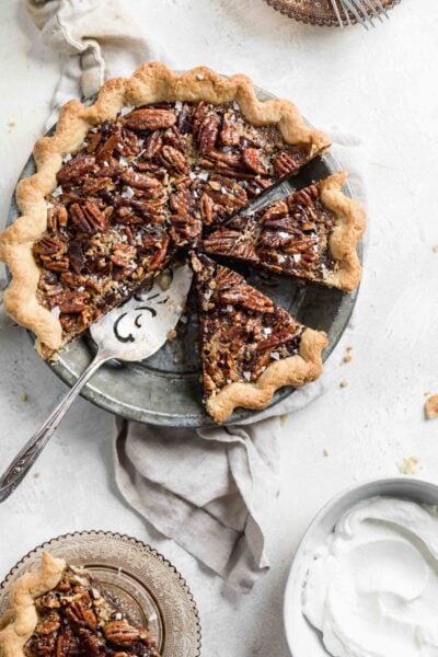 Take your pie game to the next level this Thanksgiving with this Bourbon Chocolate Pecan Pie. Loaded with chocolate chunks and a splash of bourbon, this pecan pie is the perfect ending to your Thanksgiving feast!