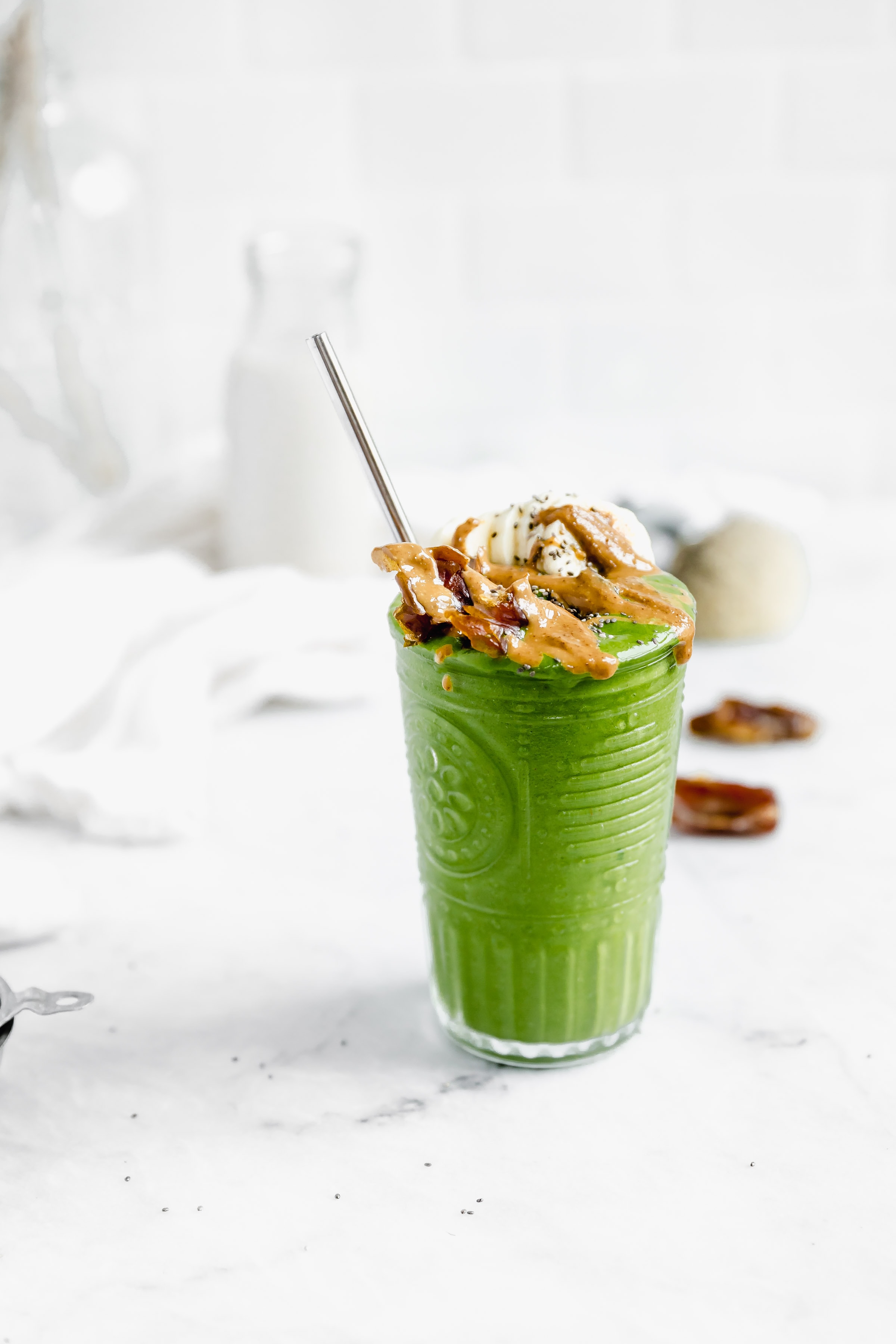 matcha green smoothie with straw