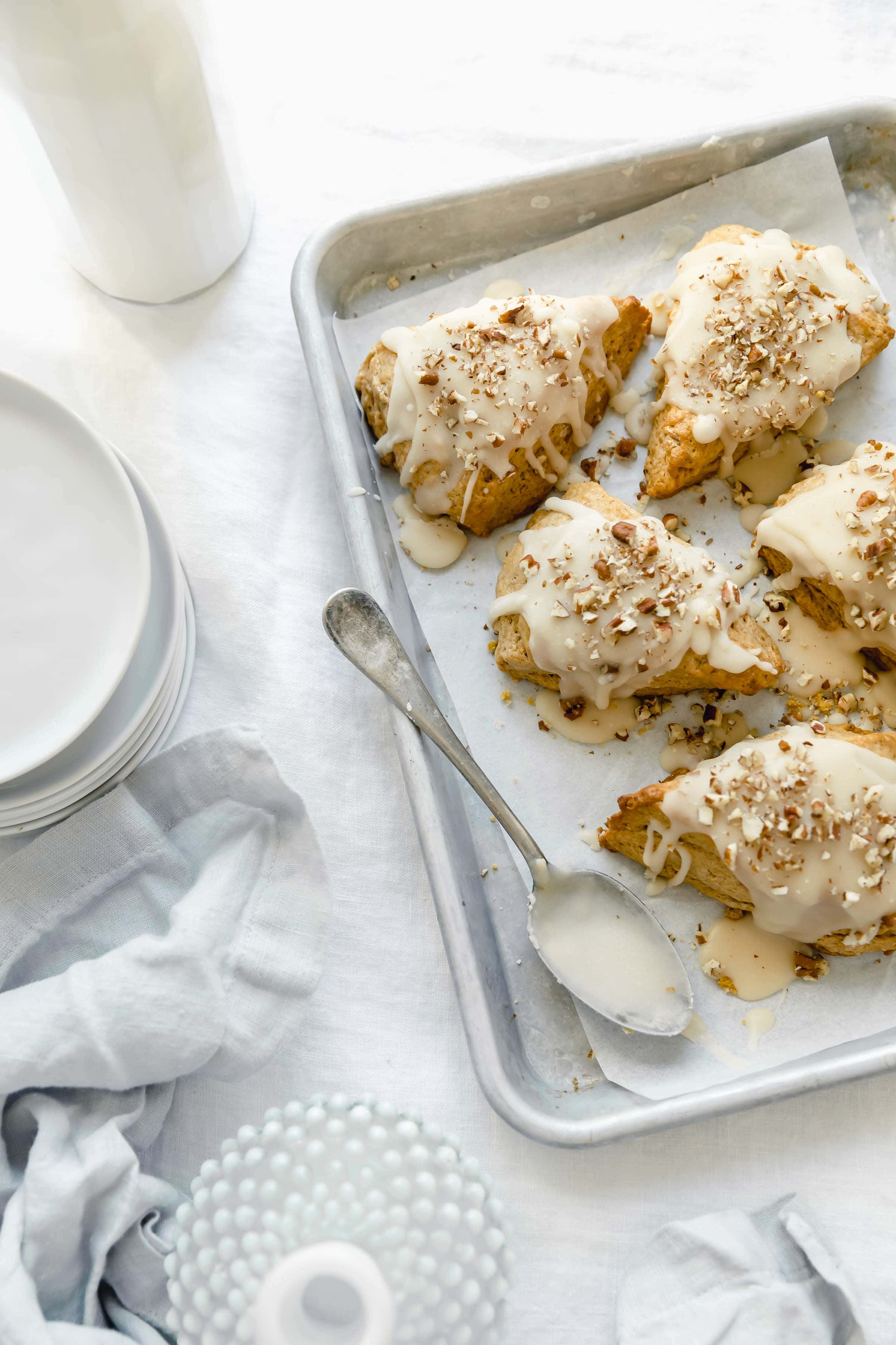 Sky high moist af pumpkin scones drizzled with maple icing and devoured in seconds