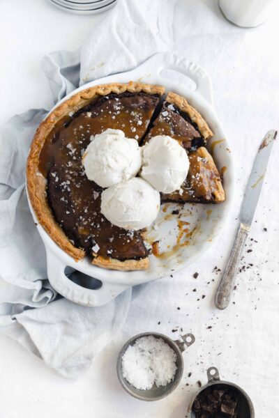 This is the salted caramel brownie pie of your dreams. Topped with vanilla ice cream and smothered in salted caramel sauce, you'd never believe how easy it is to make.