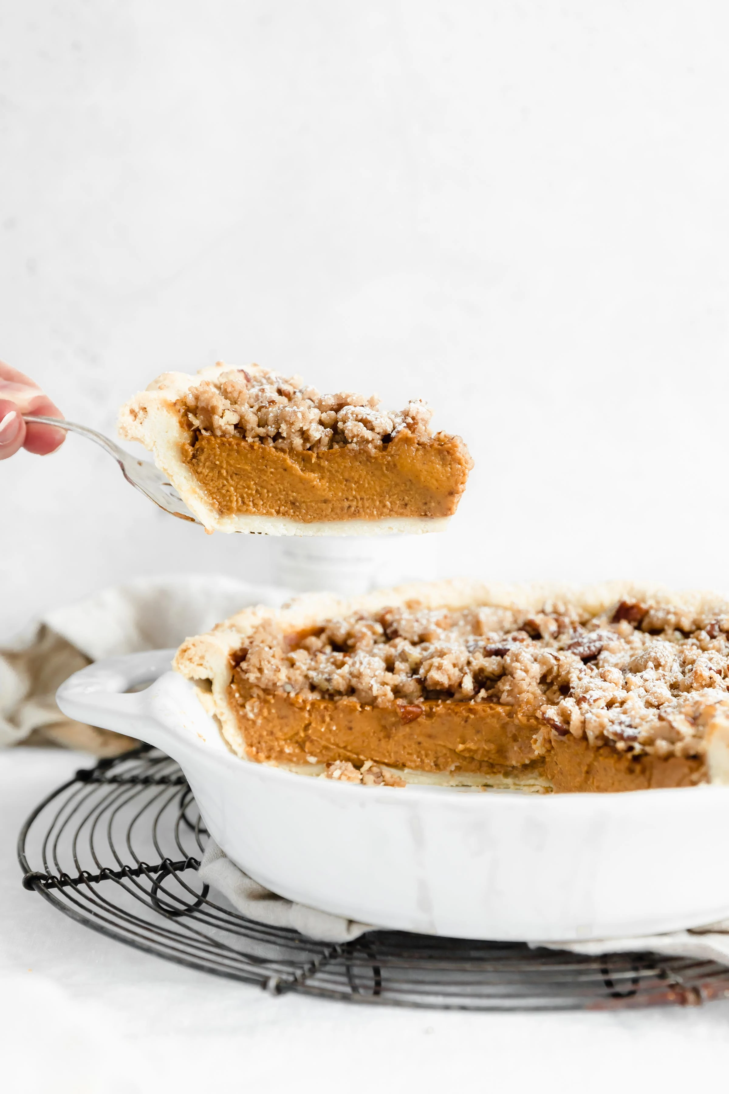 This perfectly spiced sweet potato pie with a decadent, buttery almond streusel. The perfect addition to your pie table this Thanksgiving!