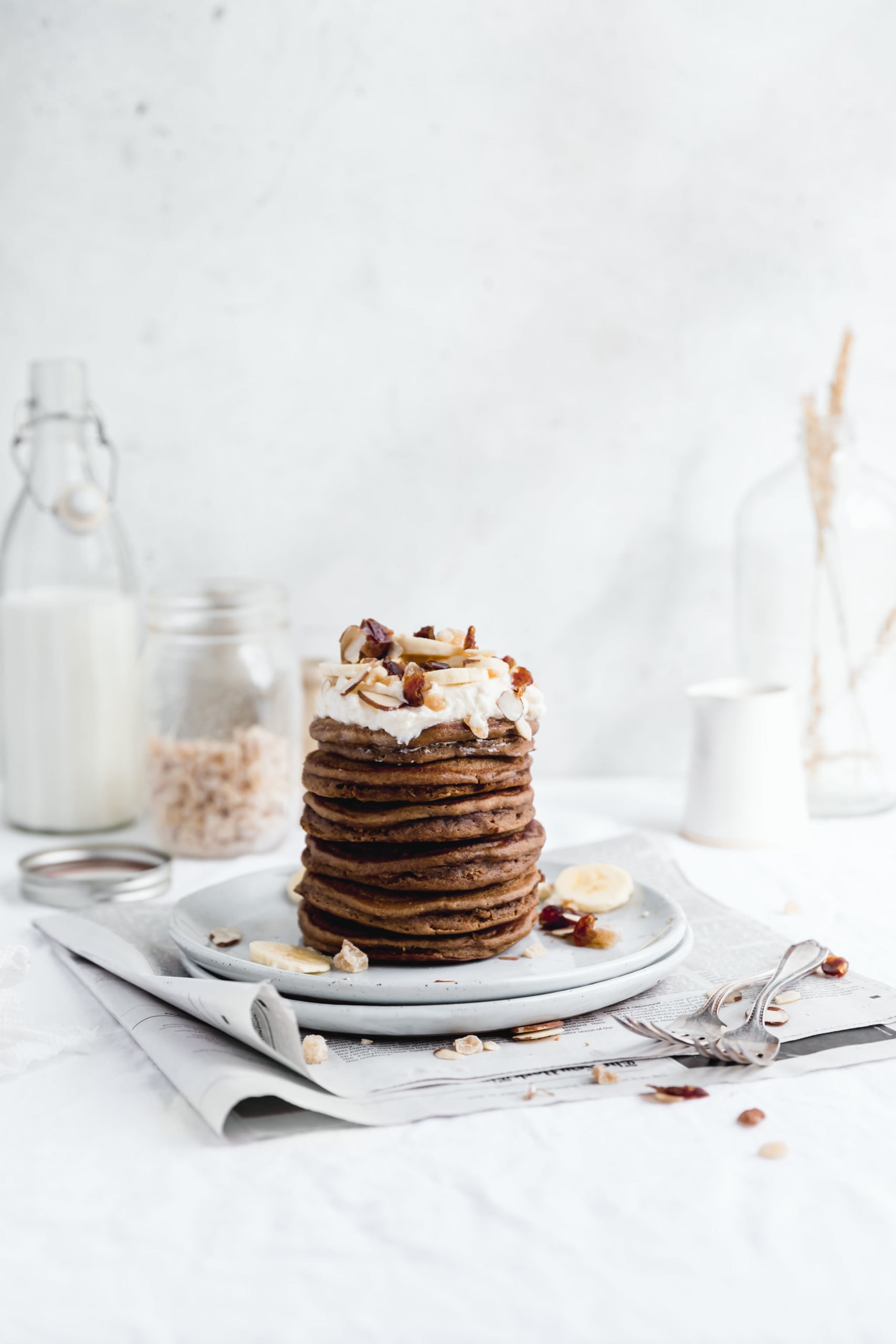 Start your Christmas morning off right with a fat stack of these fluffy gingerbread pancakes. Topped with a healthy pour of maple syrup, these pancakes are perfect for the holidays!
