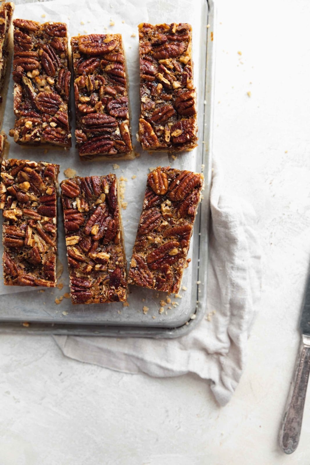 maple pecan cookie bars on a cookie sheet 