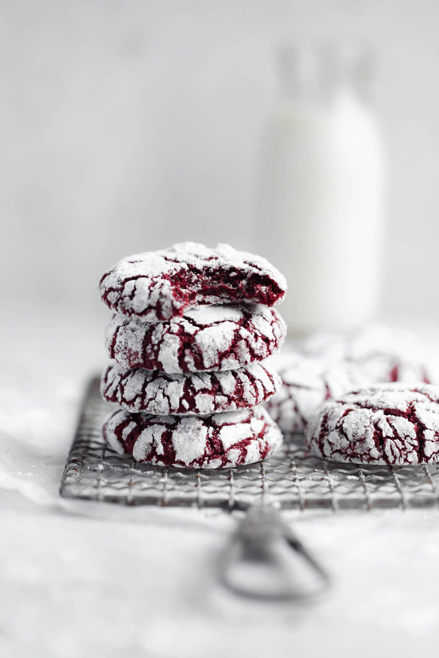 fudgy red velvet crinkle cookies coated in powdered sugar