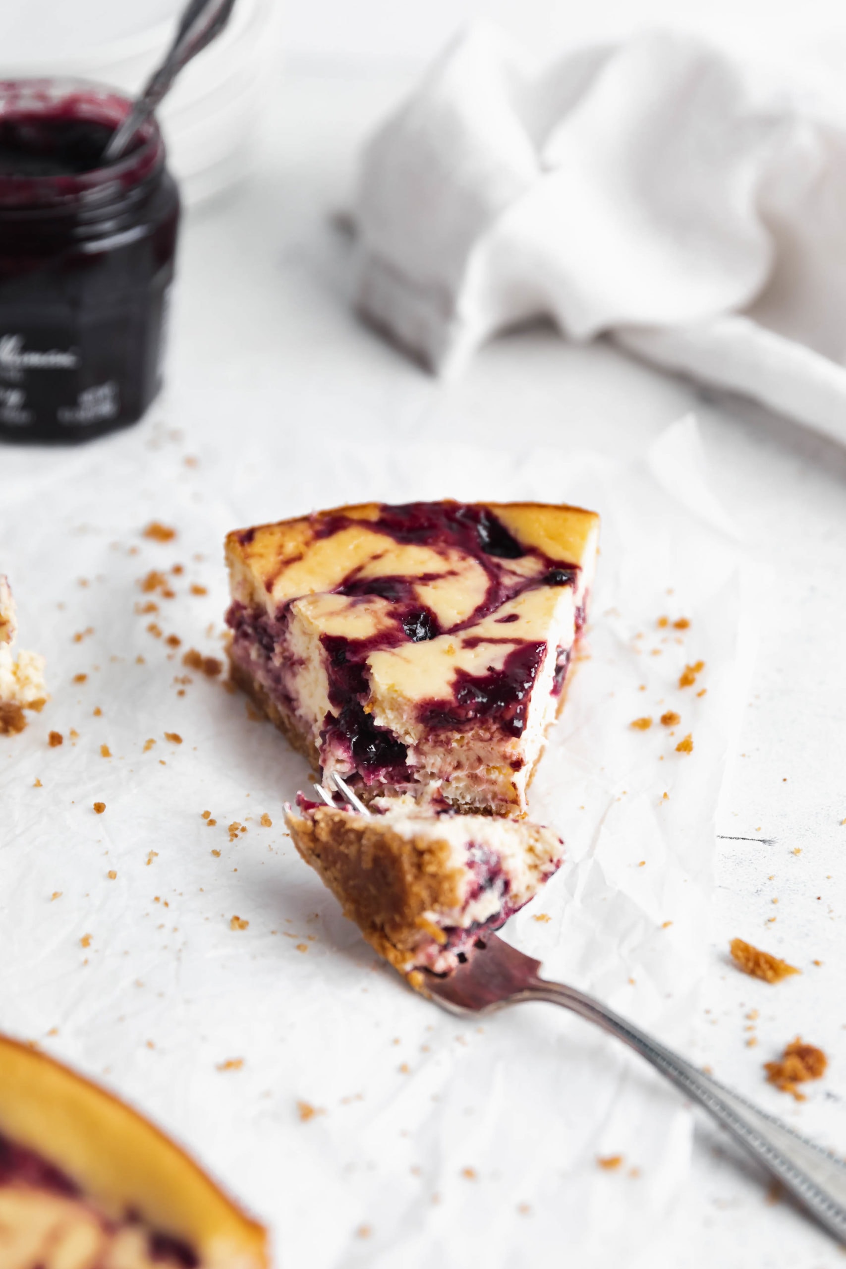 slice of healthy cherry cheesecake with a fork