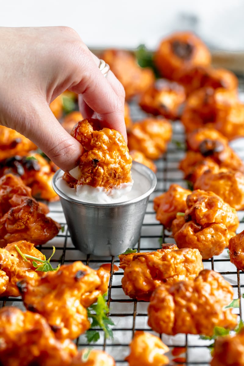 serve up these vegan buffalo cauliflower wings with some dipping sauces!