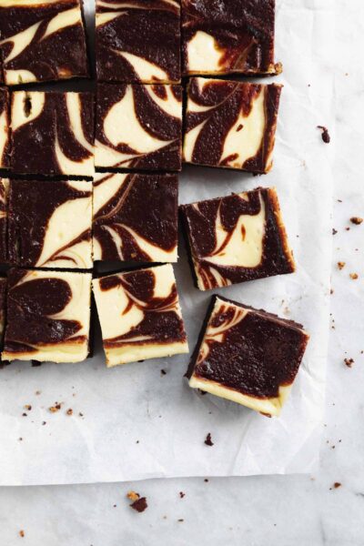 cheesecake brownies on marble counter