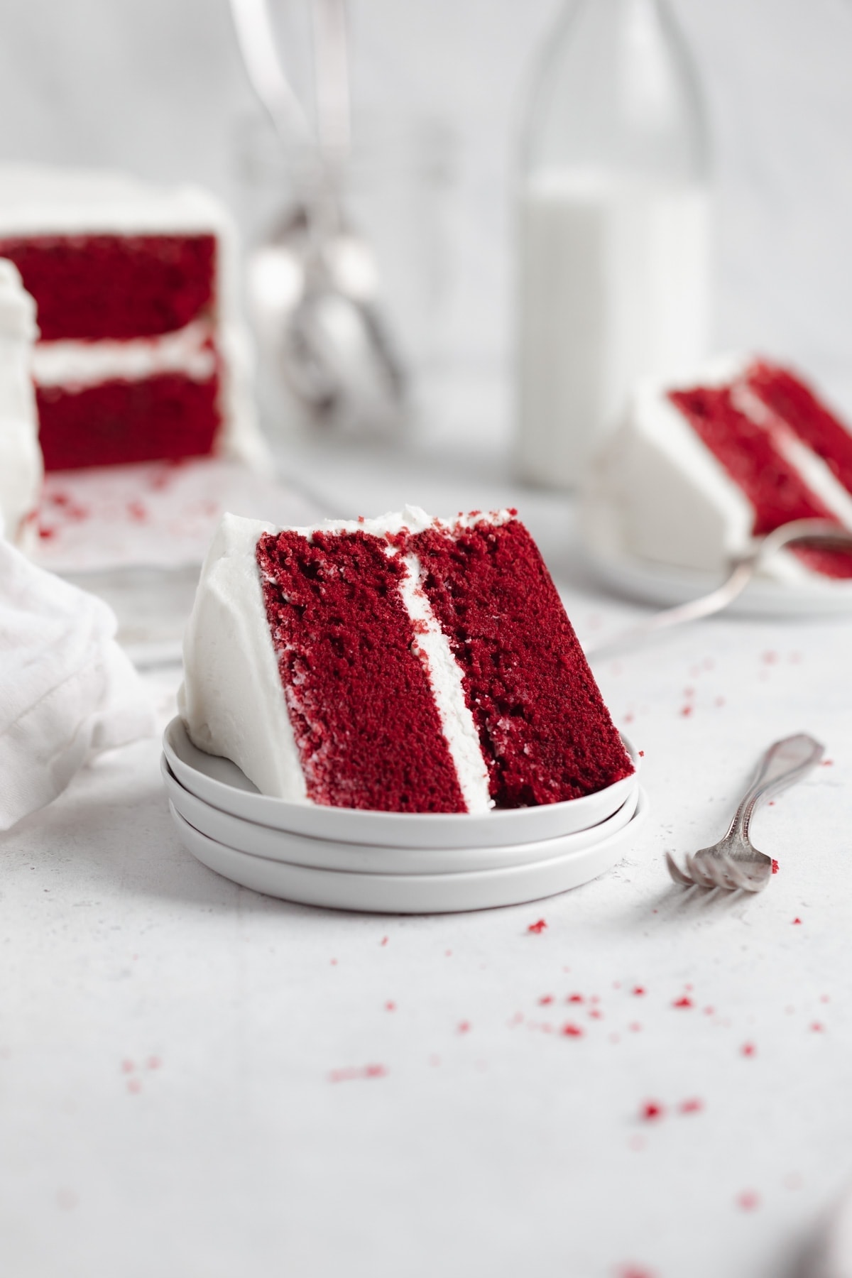 slice of red velvet cake with cream cheese frosting