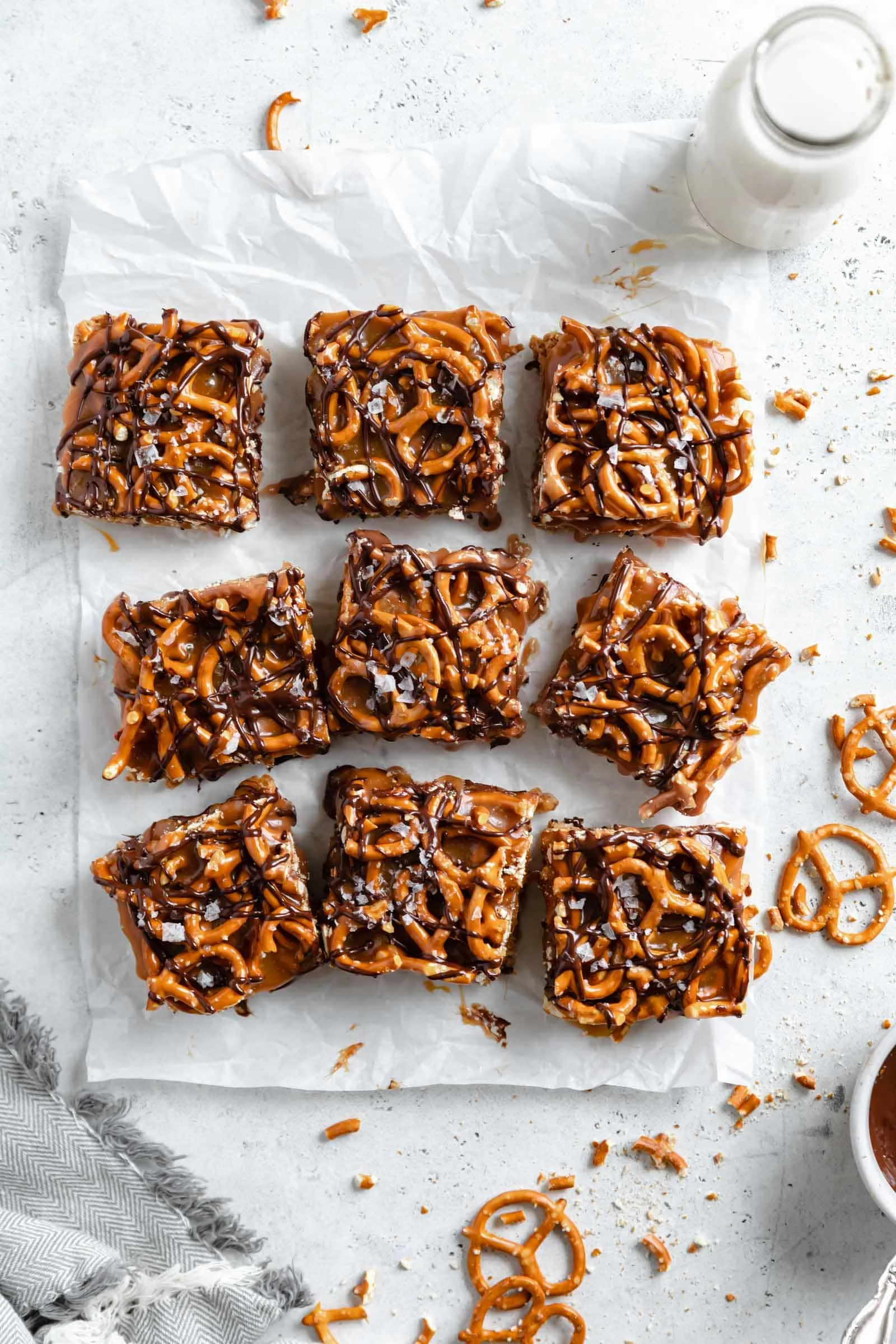 peanut butter pretzels no bake bars drizzled with caramel and chocolate