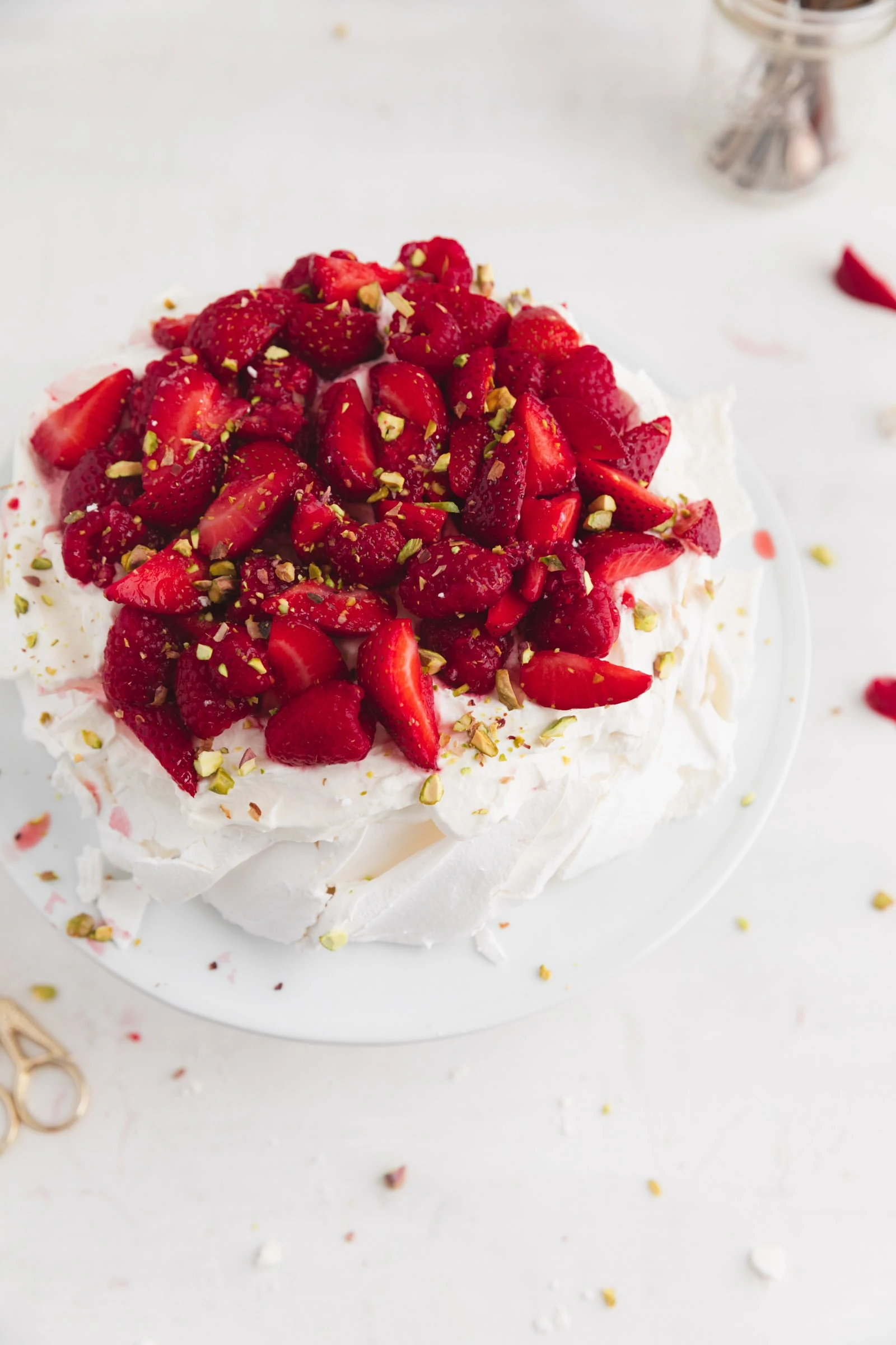 summer pavlova topped with berries