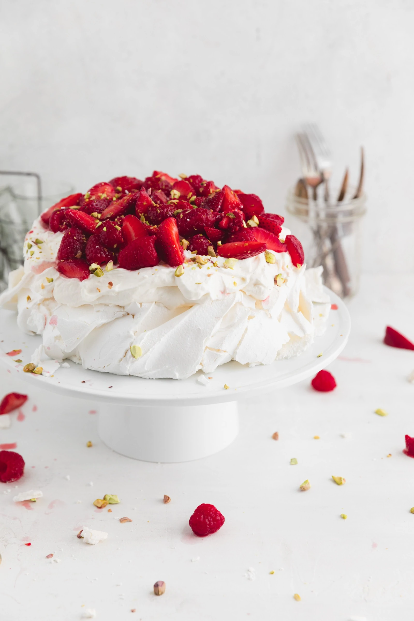 easy pavlova with berries and whipped cream