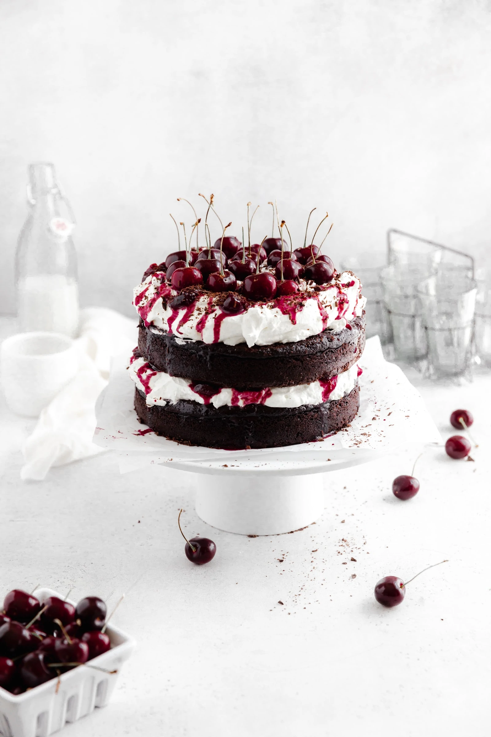 black forest cake with whipped cream with cherries