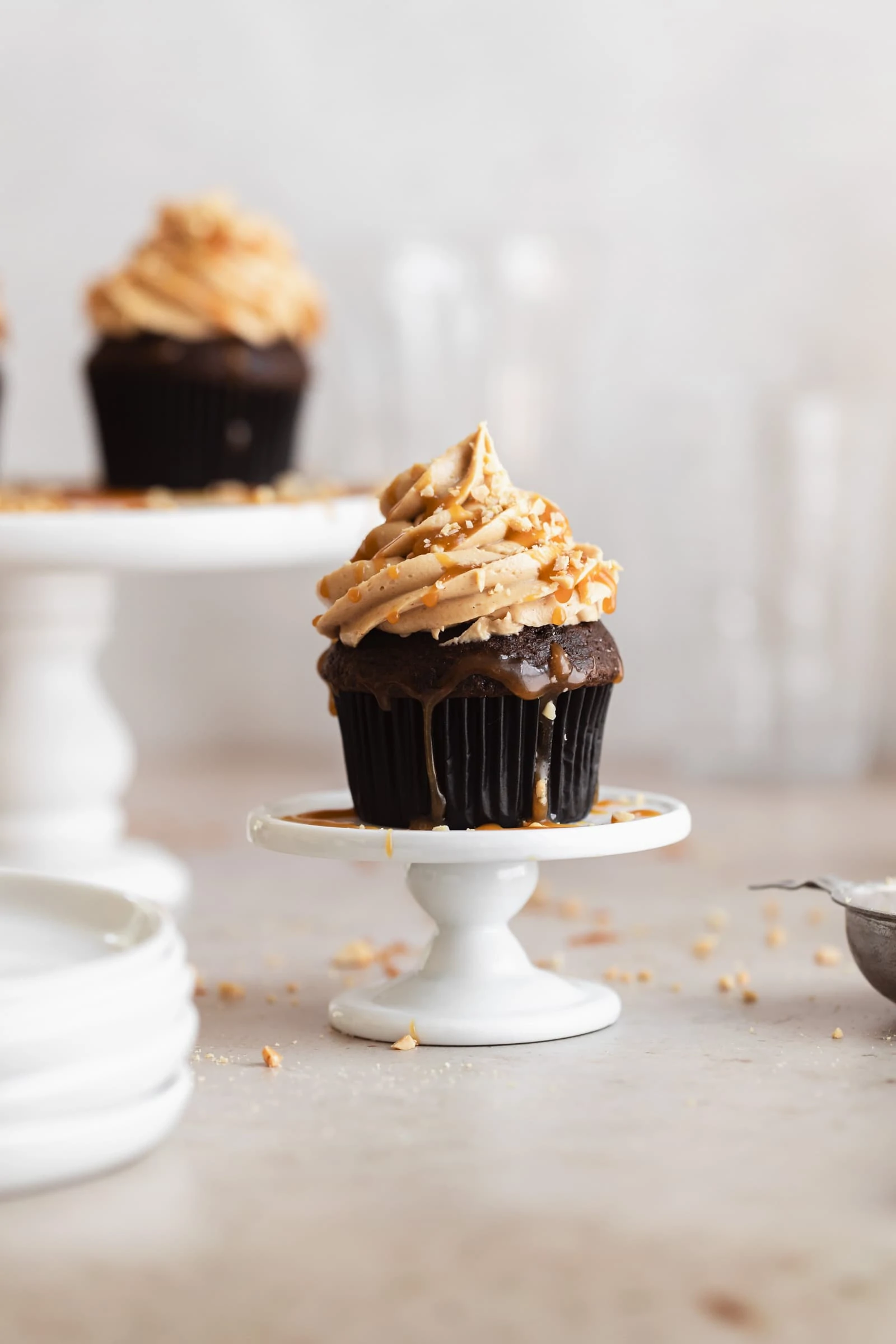 chocolate peanut butter cupcakes with salted caramel drizzle