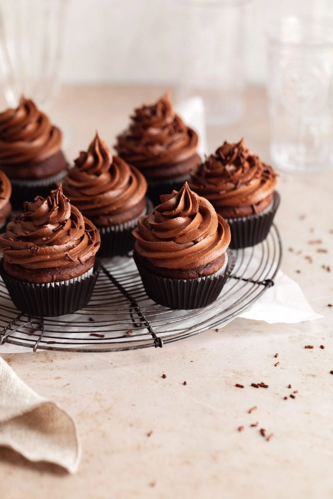 perfect chocolate cupcakes on a cooling rack