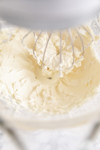 cream cheese and butter beaten together in a bowl