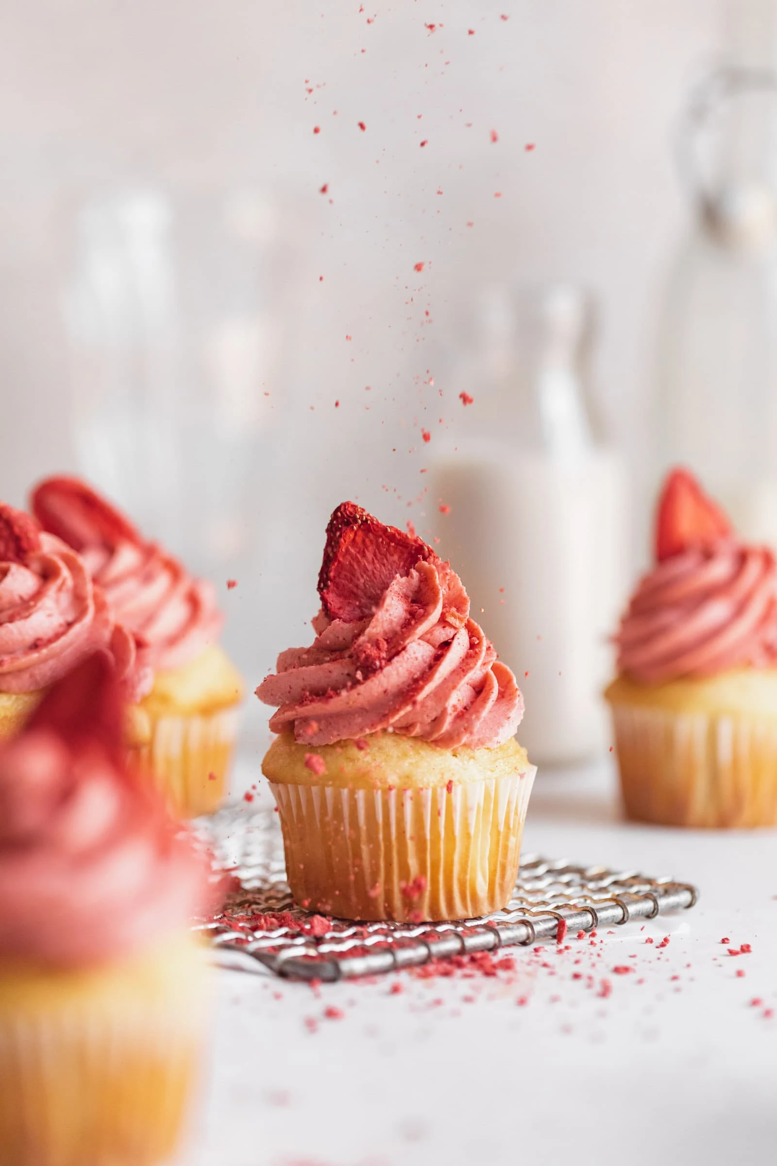 strawberry frosting on a cupcake