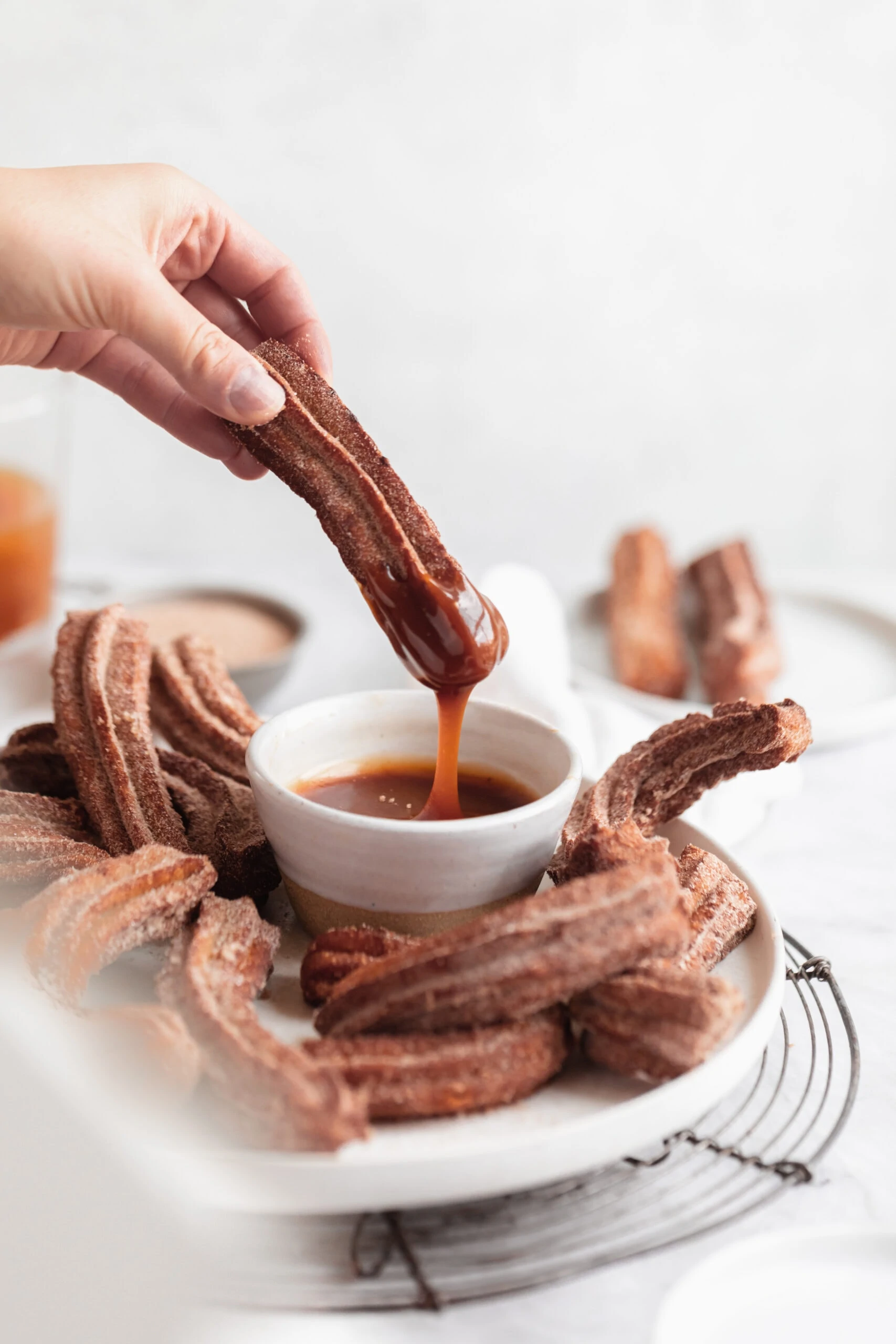 apple cider churros dipped in salted caramel