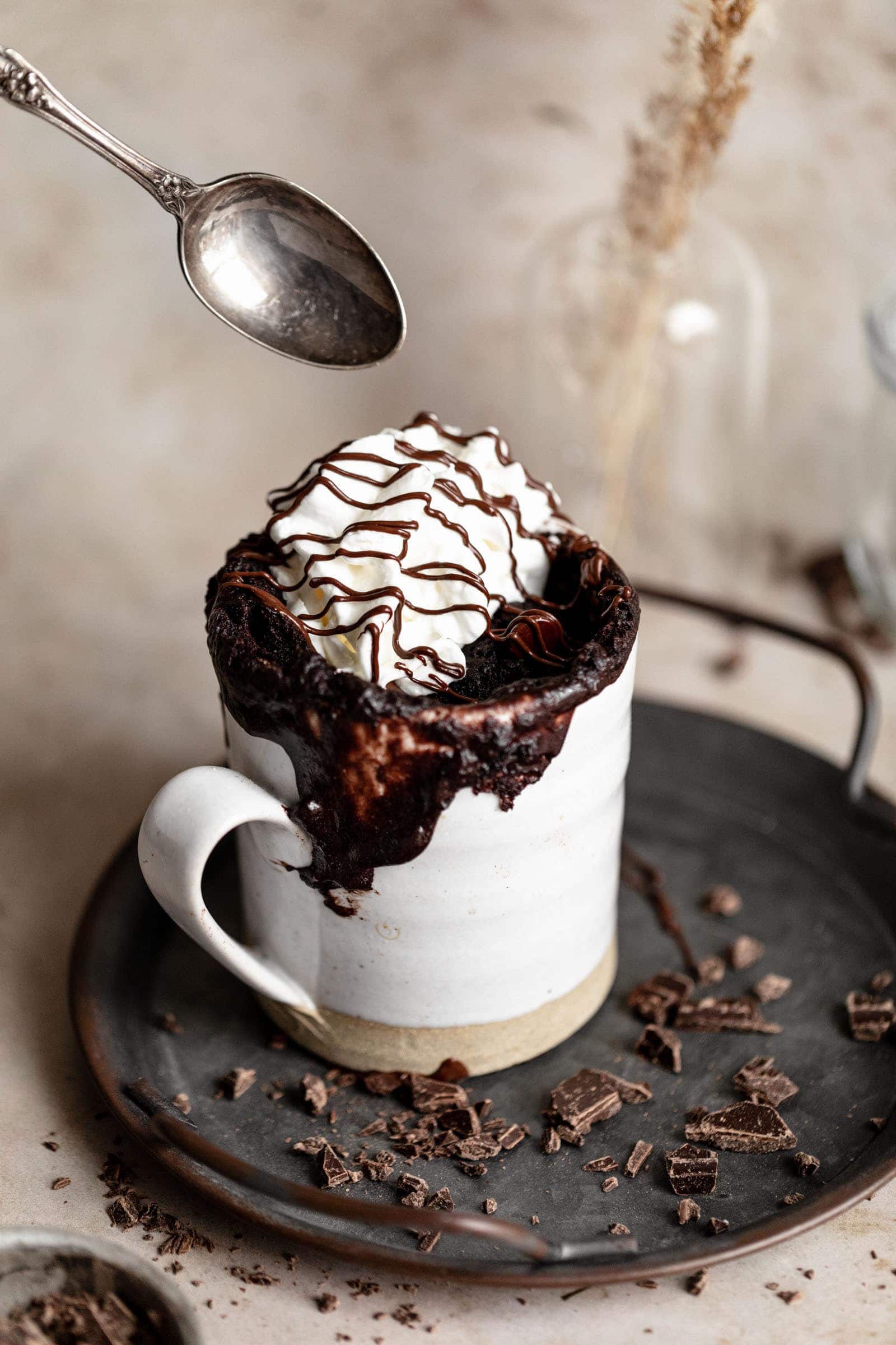 chocolate mug cake with whipped cream