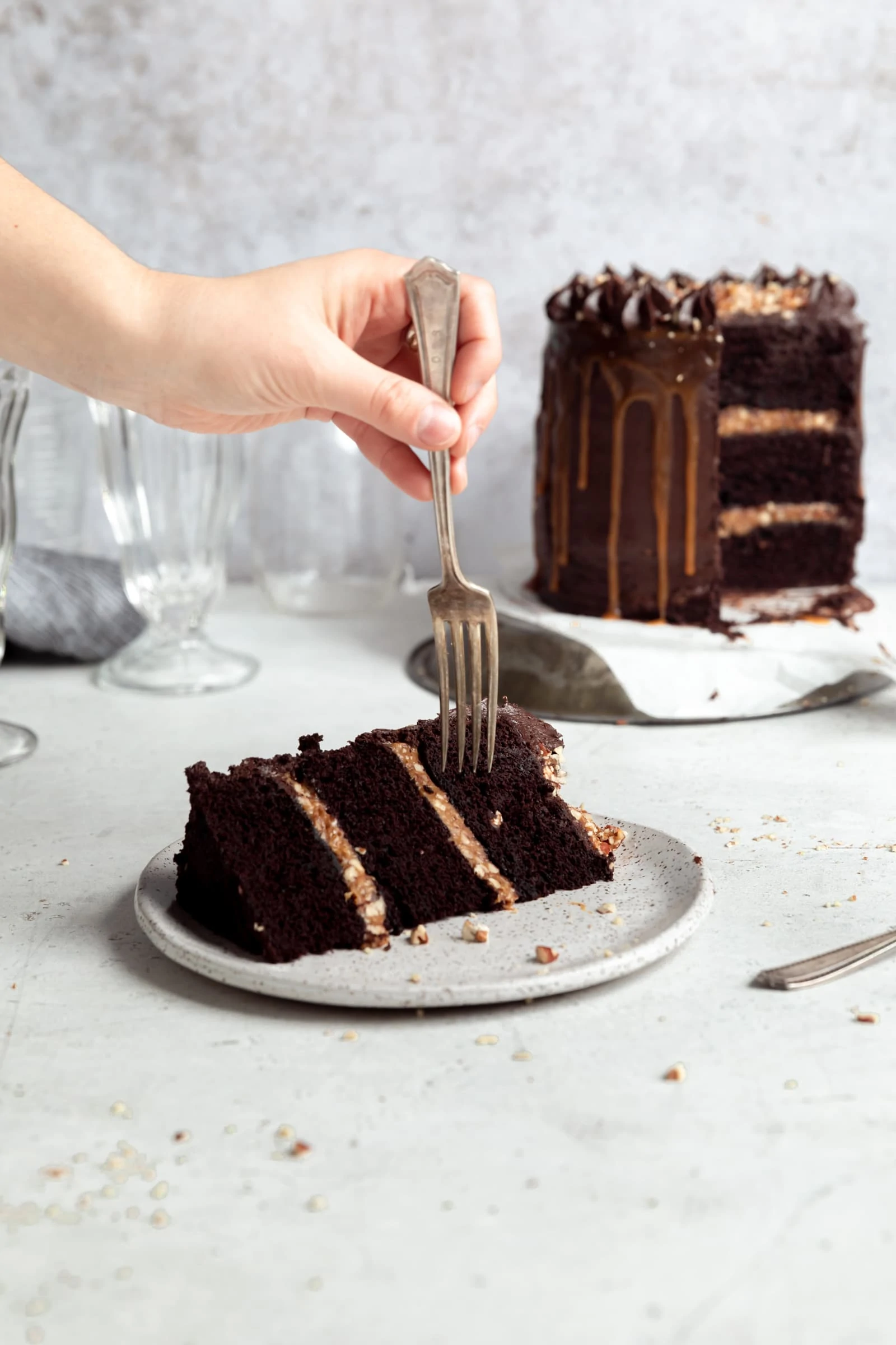 chocolate turtle layer cake slice