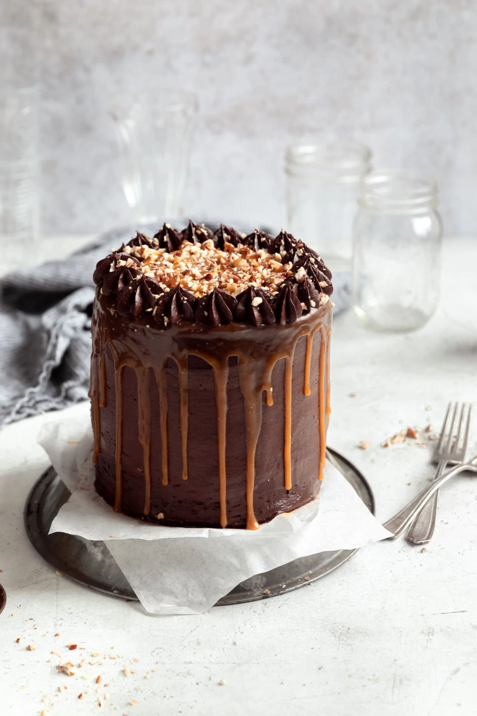 chocolate turtle cake with caramel and pecans