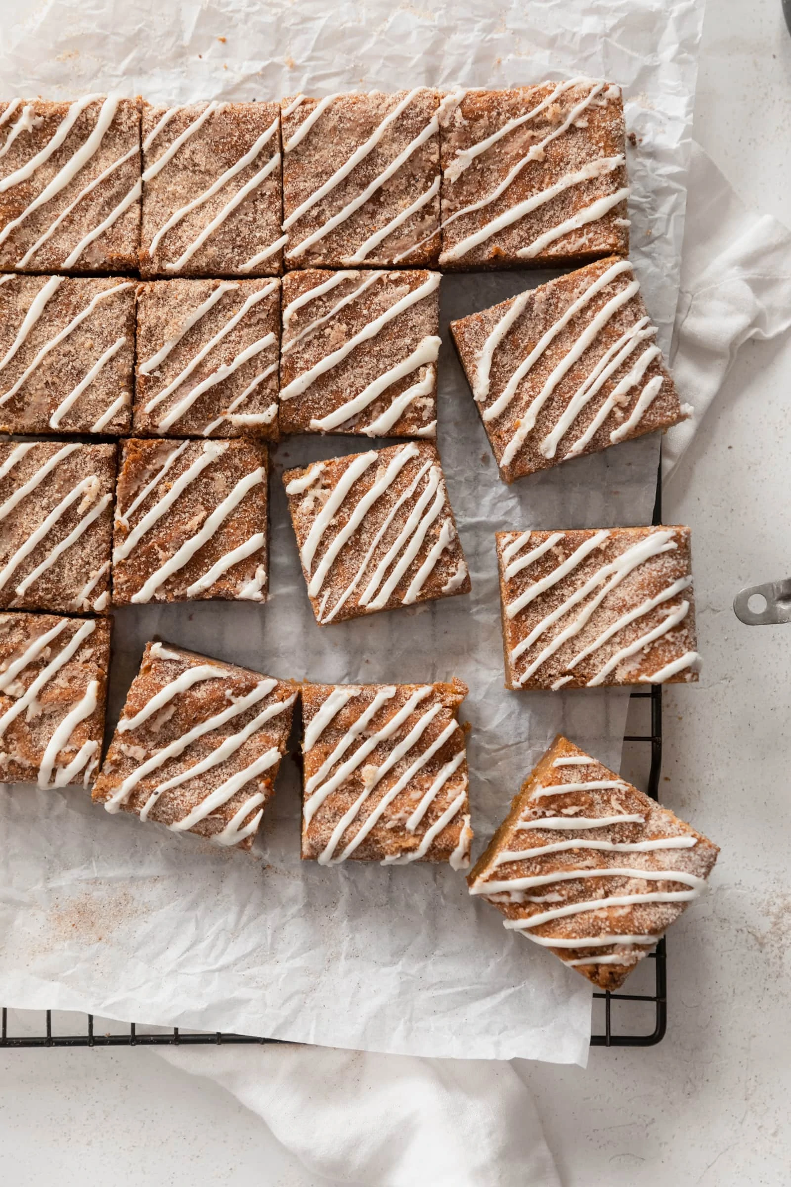 ginger molasses blondies with white chocolate drizzle