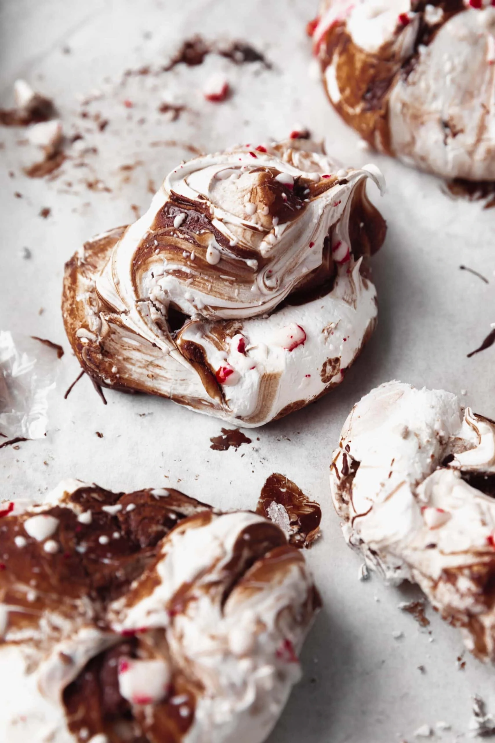 chocolate peppermint meringue cookies with crushed up candy canes