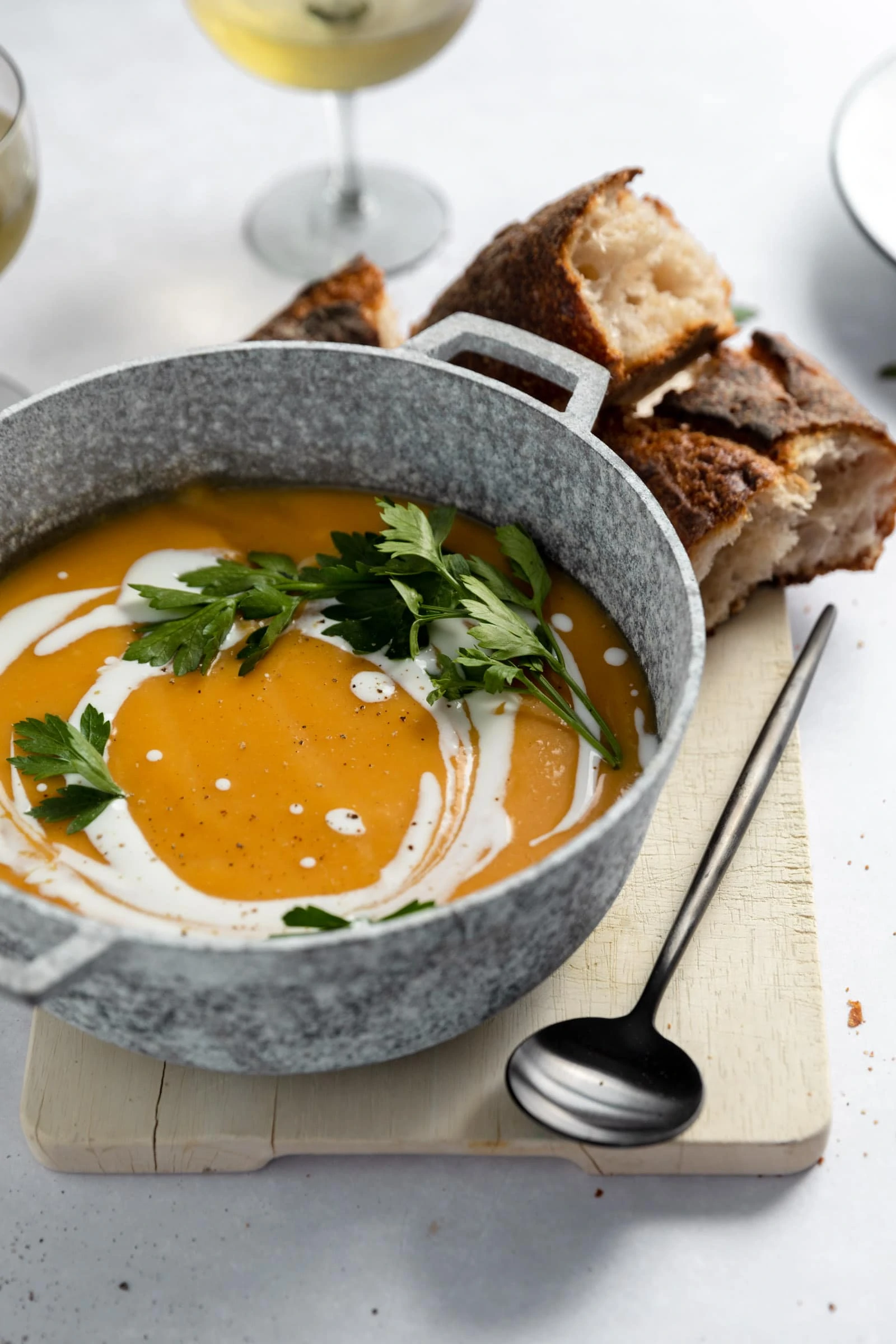 butternut squash soup topped with yogurt and cilantro