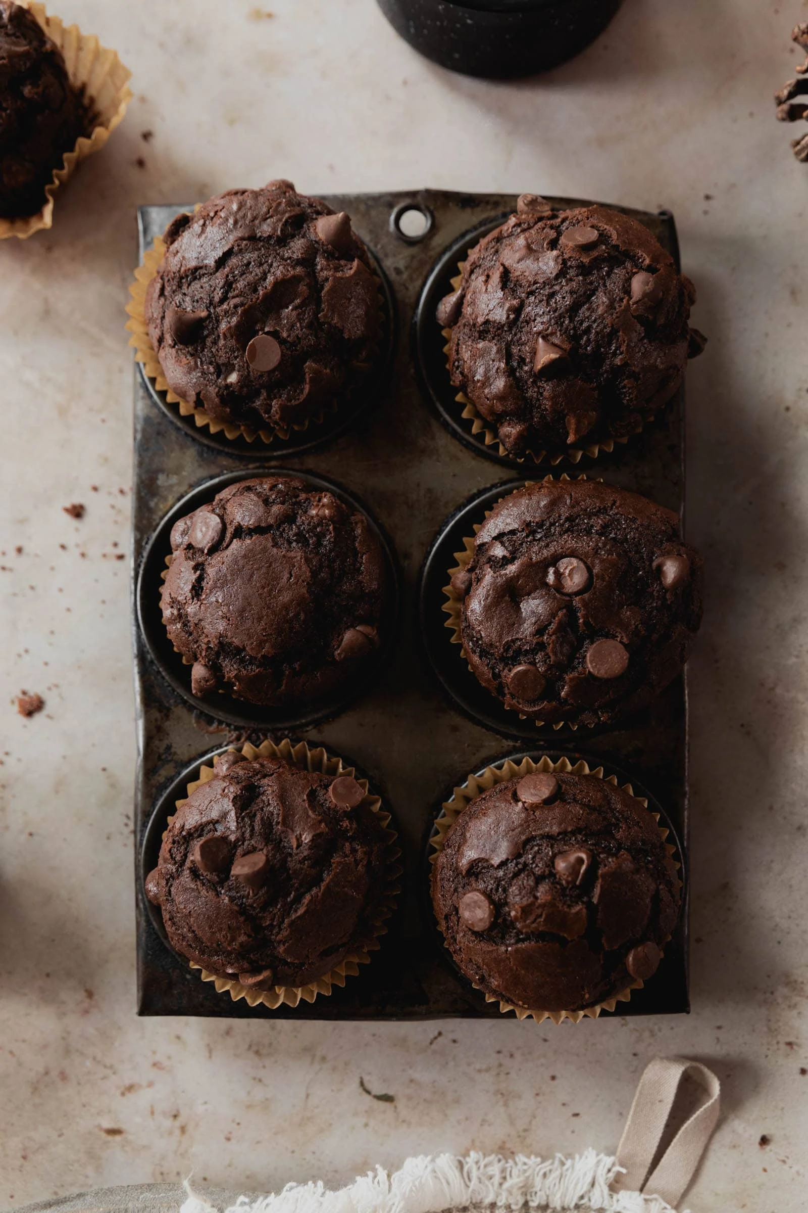 double chocolate muffins in a muffin tin