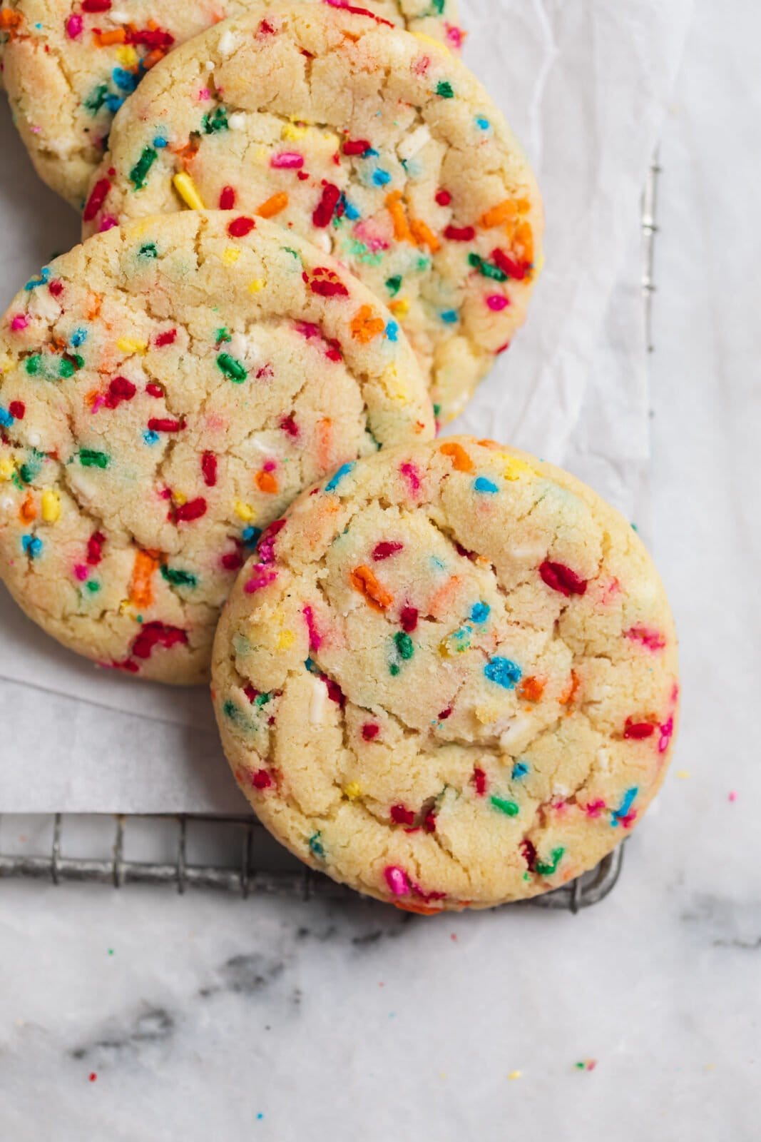 funfetti cookies on a cookie sheet
