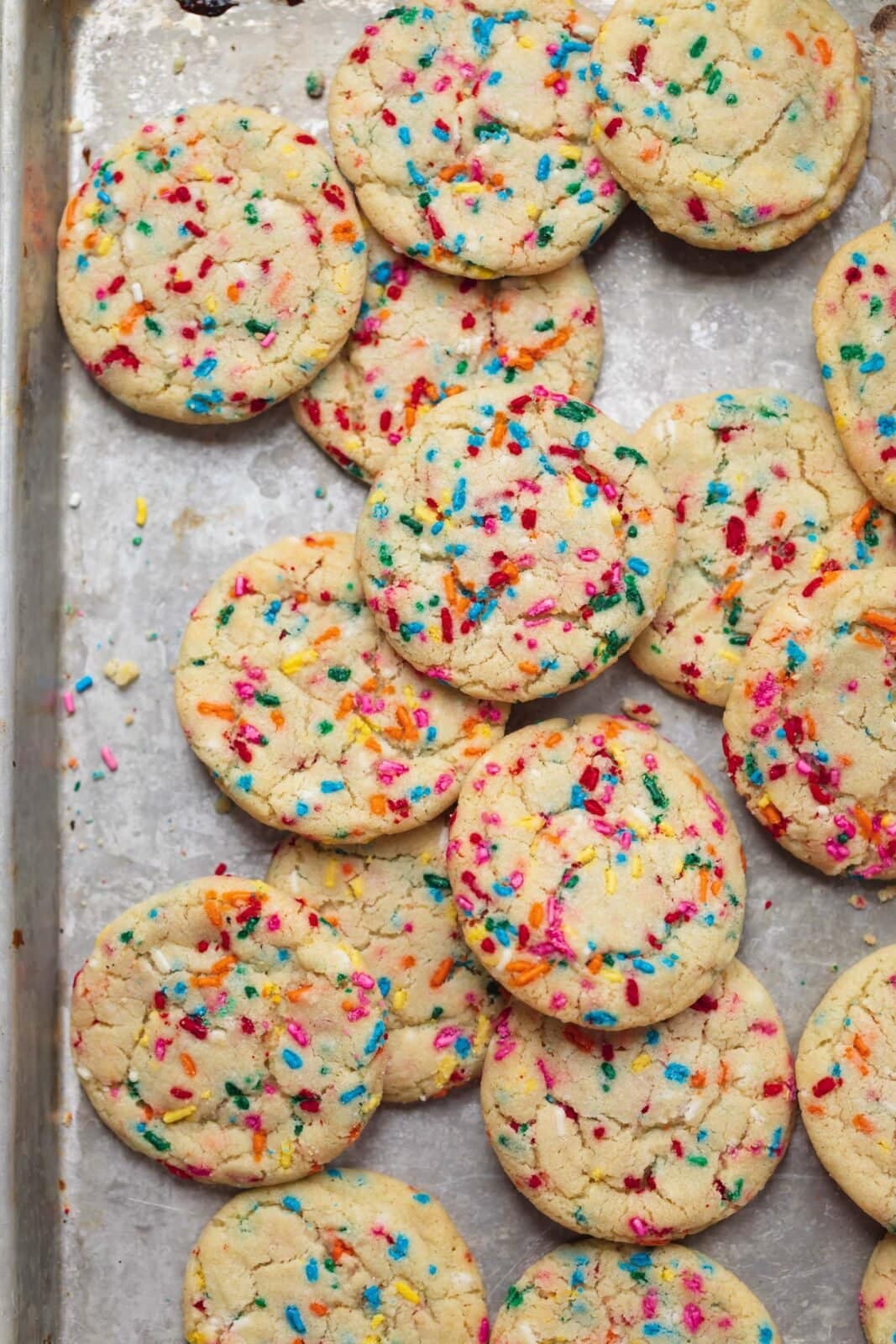 funfetti sugar cookies on a cookie sheet
