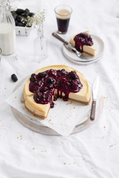 the perfect homemade cheesecake with berry compote