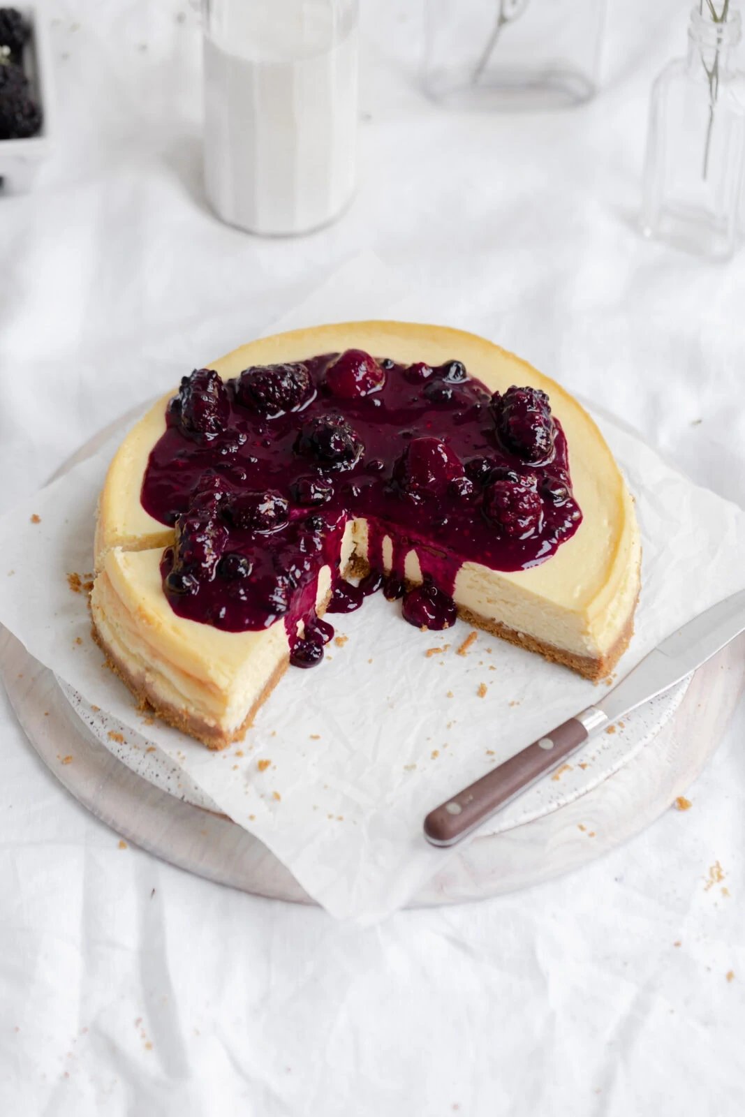 homemade cheesecake with berry compote