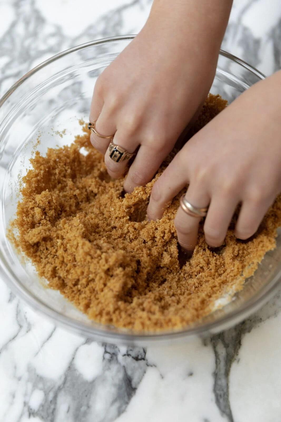 rub together the cheesecake batter until it looks like wet sand