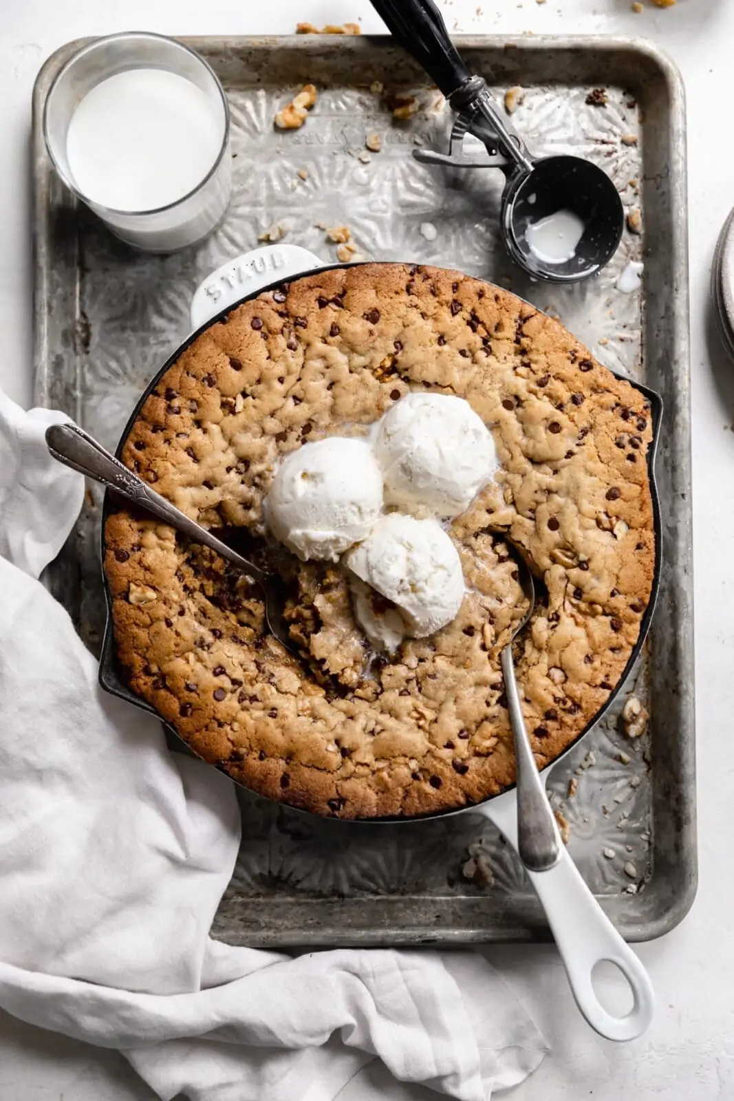 chocolate chip skillet cookie with ice cream and milk